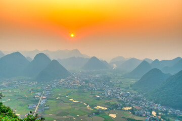 Landscape in Bac Son valley around with mountains panorama view and sunset sky in Lang Son, Vietnam