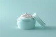 © Barra Fire - Skincare jar with cosmetic anti aging cream swirl texture and lid isolated on pale blue background. Hyaluronic acid moisturizer product