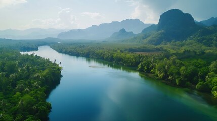 Wall Mural - beautiful natural scenery of river in southeast asia tropical green forest with mountains in backgro