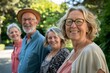 © Igor - Portrait of happy senior friends standing together in park on a sunny day