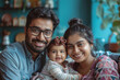 © PRASANNAPIX - Indian couple giving happy expression with his baby girl child