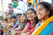 © PRASANNAPIX - children and adults enjoying in the ride of roller coaster