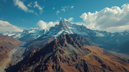 Canvas Print - Aerial view of the Andes Mountains in Argentina, featuring the rugged peaks, deep valleys, and glacial lakes, with the famous Aconcagua mountain.     