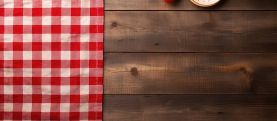 Poster - Top view of a wooden background with an empty cutting board and a tablecloth providing ample copy space for an image
