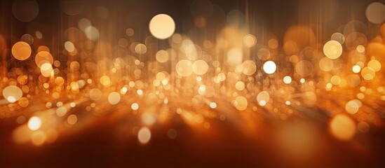 Wall Mural - an abstract background with orange light bokeh providing ample copy space for images