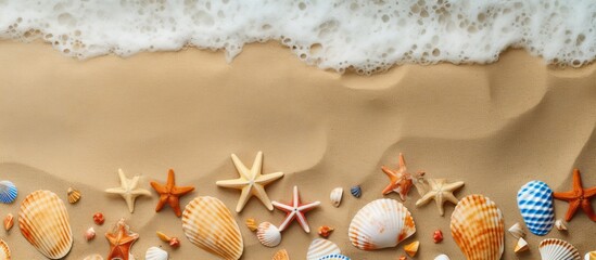 Aufkleber - Striped flip flops adorned with seashells and starfishes on a sandy background in a copy space image
