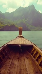 Wall Mural - long tail boat sailing in the tropical area Koh Phi Phi. Beautiful summer vacation destination. Travel,Holiday concept. Boat on blue clear lagoon Thailand . Beautiful view 4k video Vertical