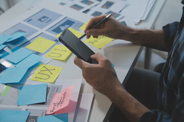 ux Graphic designer creative sketch planning application process development prototype wireframe for web mobile phone . User experience concept.