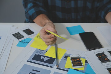 ux Graphic designer creative sketch planning application process development prototype wireframe for web mobile phone . User experience concept.