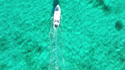 Wall Mural - Aerial Paradise: Boating the Turquoise Waters of Turks and Caicos.