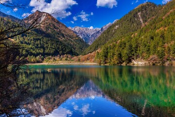 Wall Mural - Scenic view of a lake in mountains of Jiuzhaigou valley in China