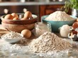 A variety of baking ingredients are arranged on a kitchen counter, including flour, eggs, sugar, and a wooden bowl.