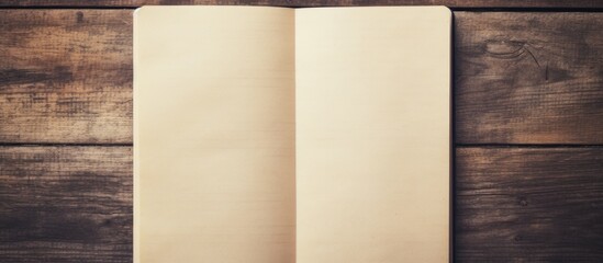 Poster - Vintage style pictures of blank notebook paper on a wooden background with a vintage effect providing ample space for copy or images