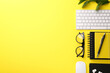 © New Africa - Flat lay composition with office stationery on yellow background, space for text