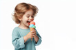 © Ольга Лукьяненко - side view happy child eating color ice cream Isolated on white background