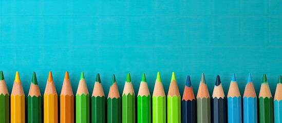 Aufkleber - Colorful pencils on a bright green paper background. copy space available