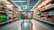© Ruslan Gilmanshin - Shopping in supermarket by supermarket cart in motion blur.
