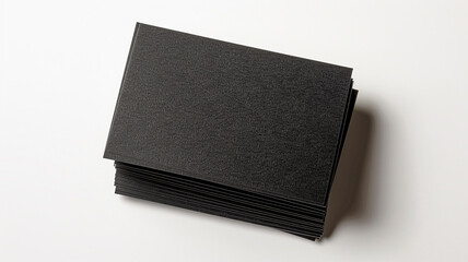 a stack of black blank business cards isolated on white background