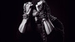 © Cliff - A man prisoner chained in a chain clinging to his head against a black background