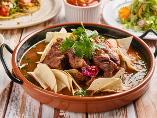 Wall Mural - Traditional mexican meat dishes with vegetable appetizers