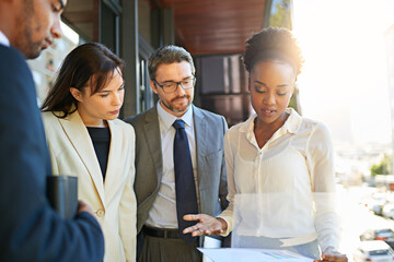 Leinwandbilder - Outdoor, men and women with document, talking and reading paperwork for planning of project and deal. Collaboration, employees and executive in discussion for meeting, bank and teamwork of corporate