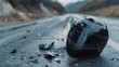 © sema_srinouljan - A broken black motorcycle helmet lying on the side of an empty road, suggesting a past accident or potential danger, and emphasizing the importance of safety gear for riders.
