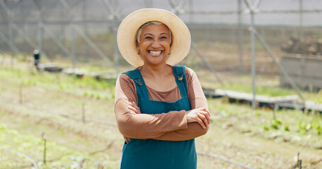 Wall Mural - Farmer, mature or face of happy woman with arms crossed or pride in agriculture farming or gardening. Nature, land or business owner with organic crops or food production in eco friendly greenhouse