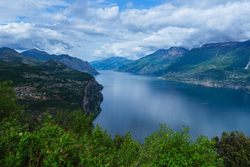 Wall Mural - Lake Garda, during spring, seen from Mount Cas, near the town of Piovere, Italy - May 4, 2024