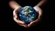 © Bijac - earth in hands on black background environmental protection and sustainability concept illustration
