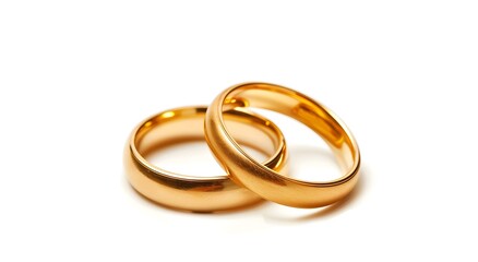 Two golden wedding rings isolated on a white background.