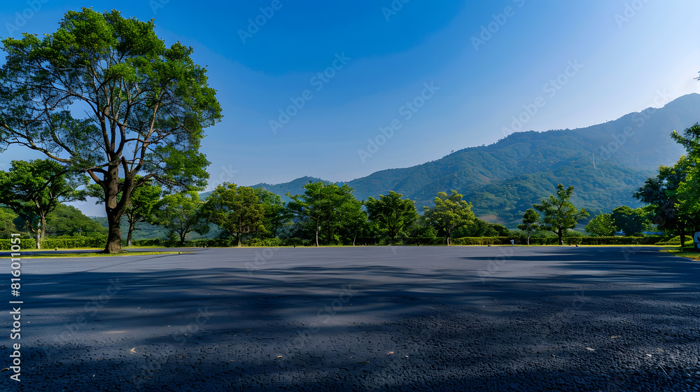 Asphalt road square and green forest with mountain natural landscape ...