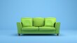 © Sohaib q - A vibrant green sofa with two cushions against a solid light blue background