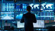 © Tomasz - Advanced Monitoring Systems - A monitoring center with multiple screens displaying various parts of the port, focusing on the engagem