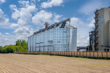 Wall Mural - silos granary elevator on agro-industrial complex with seed cleaning and drying line for grain storage