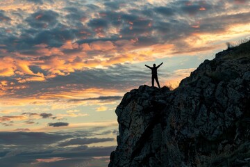 Wall Mural - Silhouette of man standing on top mountain with arms raised against sunset sky background, concept for success and achievement in business or personal life Generative AI