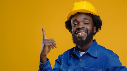 Wall Mural - Smiling Worker Pointing Upwards