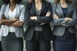 © anatolir - Three professional women exhibit confidence and teamwork in business attire