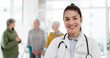 © peopleimages.com - Healthcare, confidence and woman, portrait of doctor with smile in hospital for support in senior care. Health, wellness and medicine, happy medical professional with stethoscope and mockup space.