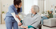 © peopleimages.com - Nurse, wheelchair and happy woman for support, healthcare service and medical kindness and nursing. Doctor, caregiver and people talking or senior patient with disability, consulting or home helping