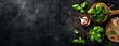 © Psychologist - A panoramic image of fresh culinary herbs and spices on a dark background; great for wallpaper or abstract concepts