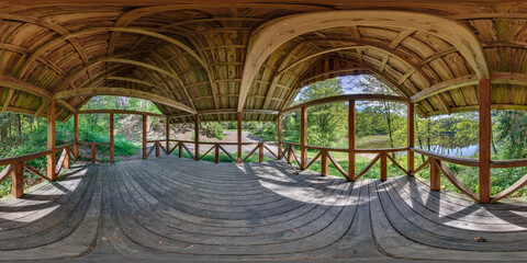 Wall Mural - 360 hdri panorama in equirectangular spherical projection in interior wooden gazebo near lake. Photorealistic VR content