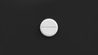White single pill isolated on a black background. Tablet, pill top view, flat lay. 3d render illustration