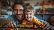 © Irina.Pl - Joyful father and son playing with toy train at home