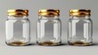 On a white background, empty glass jars with golden lids can be seen
