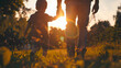 © Generative AI - Little son dad hold hands close up in nature in sun Child father walk in park at sunset family trust concept Parent kid boy outing together Adoption of child Happy family teamwork Silh : Generative AI