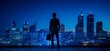 © SKIMP Art - A business man silhouette standing on the roof of an office building overlooking over city at night, holding his briefcase with skyline in background Generative AI