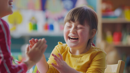 The teacher claps her hands and rejoices at the small victory of her student boy with down syndrome at painting studio for special need children Development of children with spesial ne : Generative AI