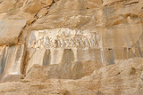 Fototapeta Desenie - The Behistun Inscription  a multilingual Achaemenid royal inscription and large rock relief on a cliff at Mount Behistun in the Kermanshah Province of Iran,