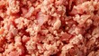 Intimate close-up of lean ground turkey, highlighting its fresh texture and suitability for turkey burgers, set against an isolated background