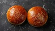 Elegant top shot of luxurious Brioche buns for burgers, showcasing their soft, fluffy texture and golden crust, isolated background for advertising